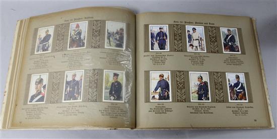 A German cigarette card album with soldiers in uniform